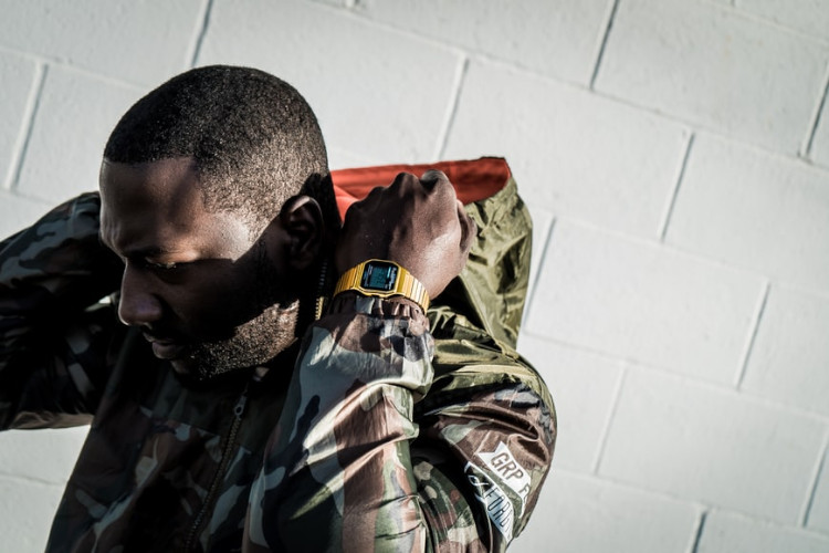 man wearing camo jacket